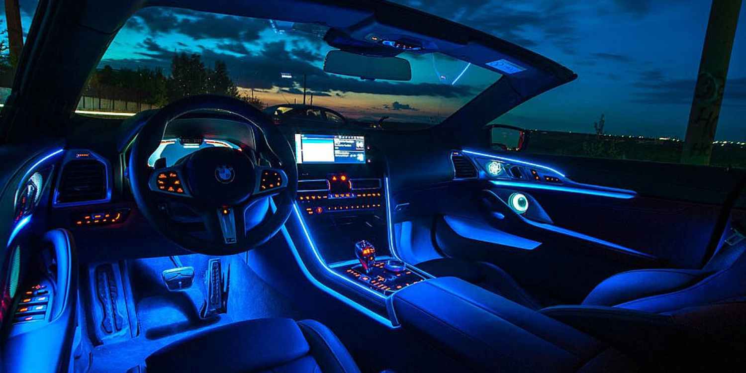 BMW ambient-lit interior at dusk